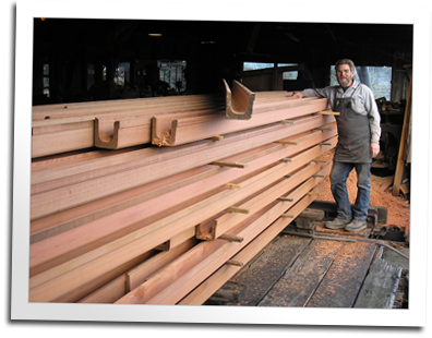Eric Hollenbeck stands with a fresh order of gutter ready to be shipped to Hawaii