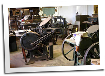 Several presses in the Blue Ox print shop